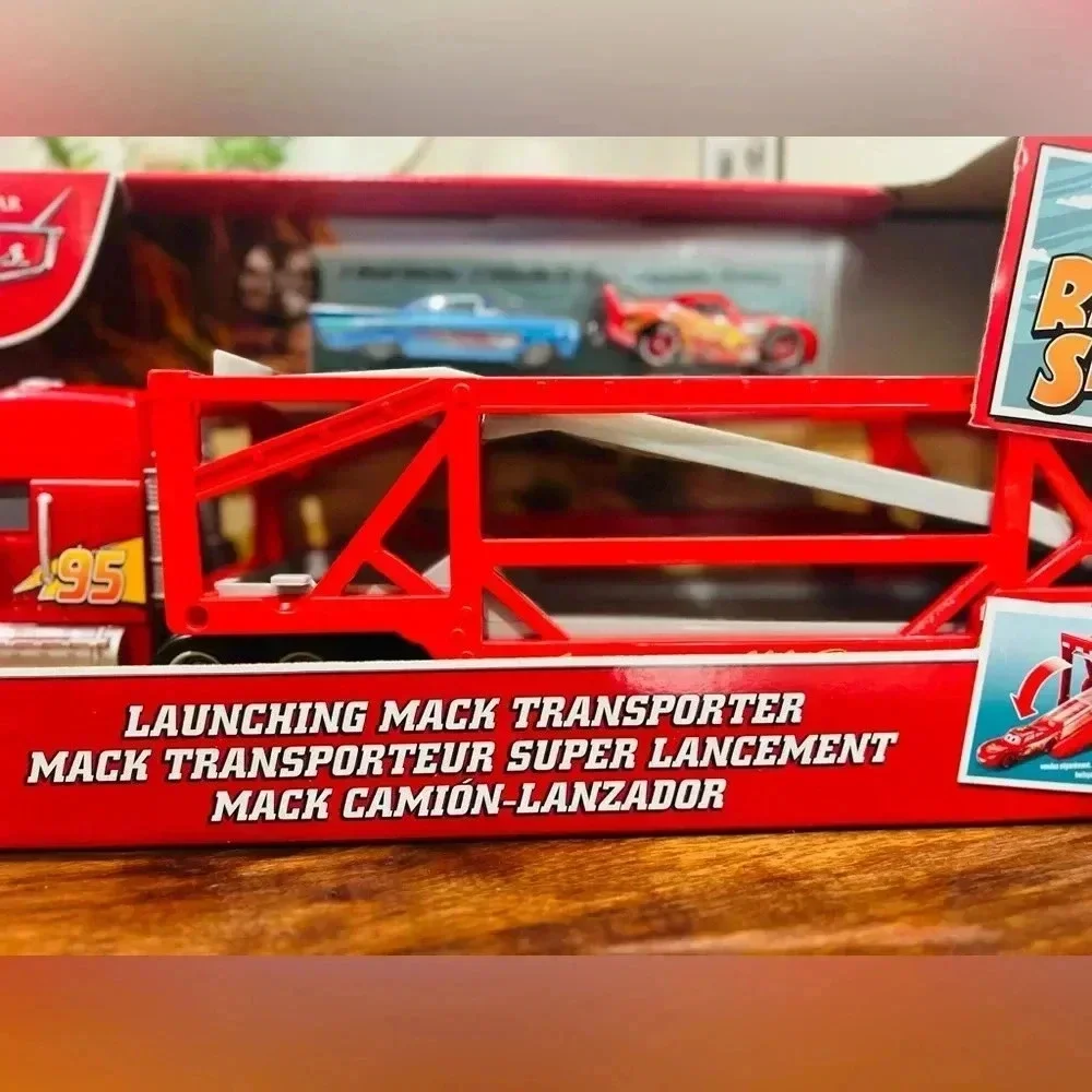 Disney Pixar Cars Launching Mack Transporter Truck Playset - Red Dinoco Transpor
